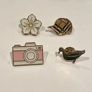 New Authentic Burberry Rare Collectible set of 4 gold brooches pins.